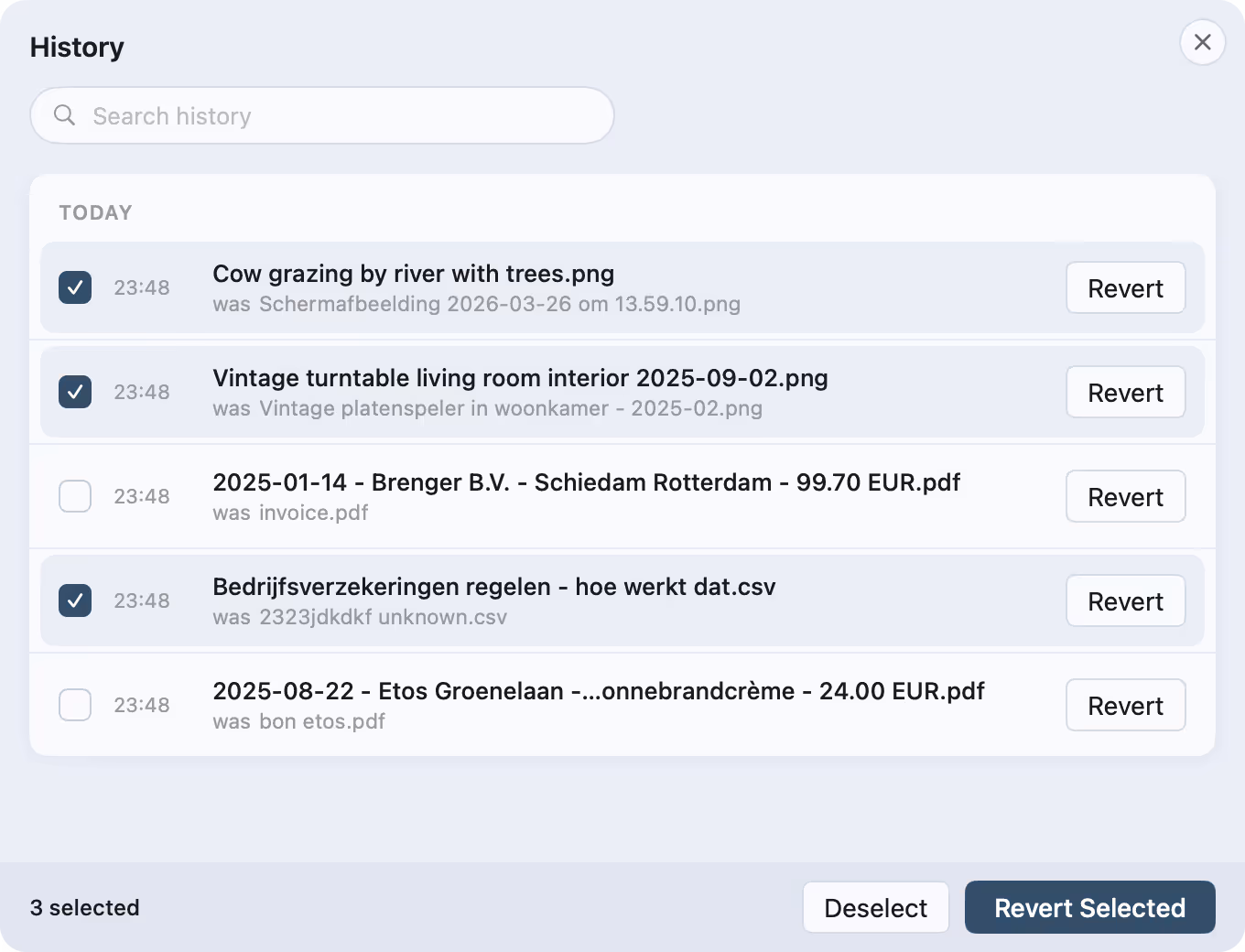 The rename history sheet with day groups, search, and per-row revert buttons