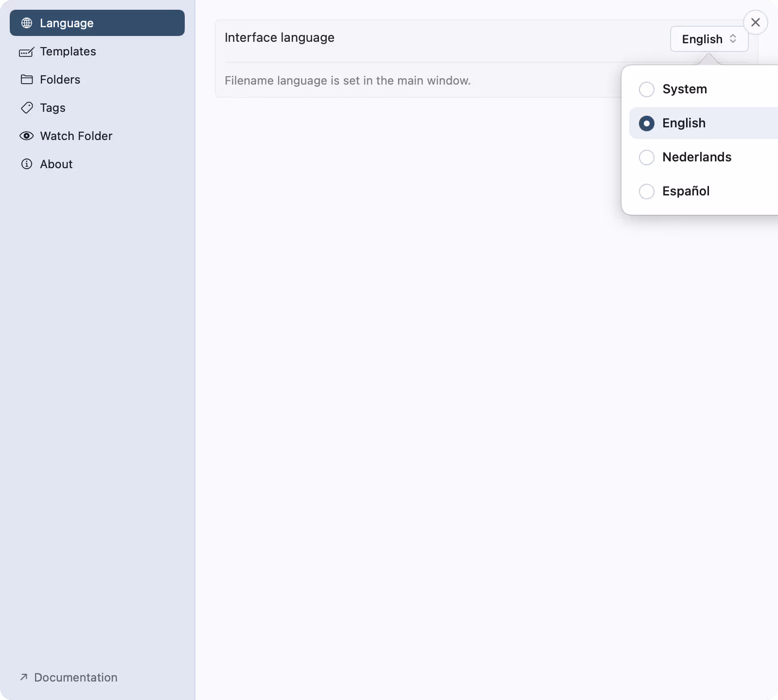 The Language tab in nymos Settings with the Interface language picker open, showing System, English, Nederlands and Español, and a note that filename language is set in the main window