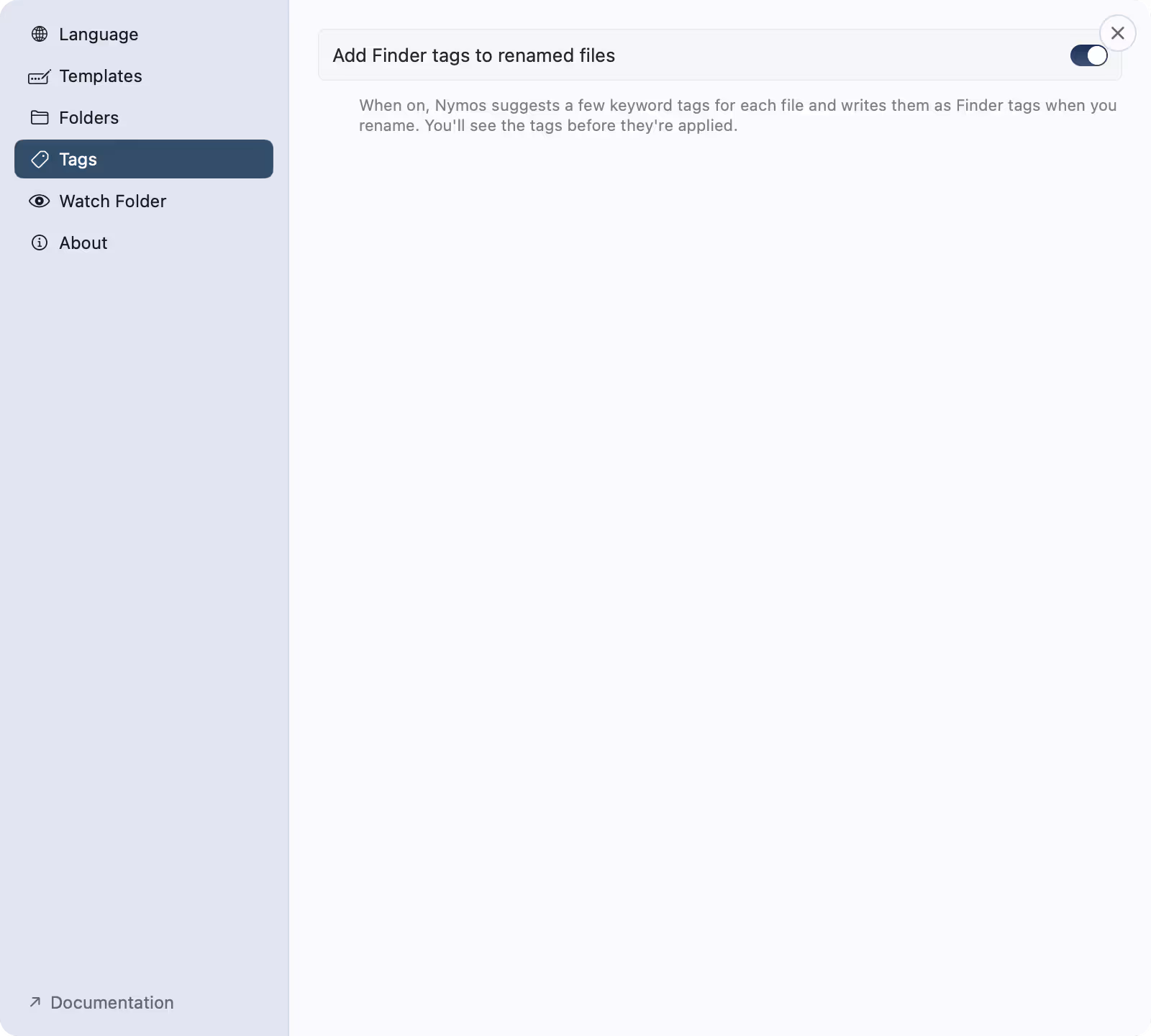 The Tags tab in nymos Settings with the 'Add Finder tags to renamed files' switch turned on and a note that suggested tags are shown before they are applied